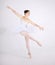 Elegance, dance and ballet with a woman in studio on a white background for rehearsal or recital for theatre performance