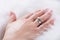 Elegance and Grace: Diamond Engagement Ring on Delicate Hands