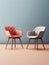 Elegance meets simplicity in this minimalist studio shoot of a beautifully designed room with two colorful chairs.