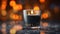 Elegance in Obsidian: Black Candle in Glass Beaker on a Matte Blurred Background