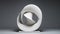 Elegant Abstraction: White Spiral Sculpture On Grey Canvas