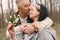 Elegant adult couple in a spring forest