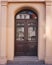 Elegant arched door, vintage building detail