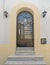 Elegant arched metallic door
