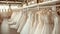 Elegant Array of Designer Wedding Dresses in a Chic Bridal Boutique.