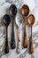 Elegant Assortment of Kitchen Spoons on Marble Surface