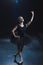 elegant ballet dancer in pointe shoes and black tutu