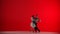 Elegant Ballroom Dance Couple on a red background