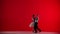 Elegant Ballroom Dance Couple on a red background