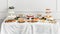 Elegant Banquet Table Setup with Assorted Gourmet Appetizers