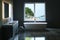 Elegant bathroom with tropical view window. 3d render