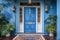 Elegant Blue Entrance Door of a Traditional Home on a Sunny Afternoon