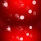 Elegant bokeh on a bright red background.