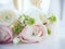 Elegant bouquet of flowers and two glasses of wine