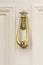 Elegant brass door knocker