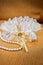 Elegant bride garter and pearls necklace