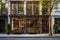 Elegant cafe facade, large windows, wooden accents, city street setting