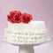 Elegant Cake and Sugar Red Roses on the Top