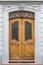Elegant carved wooden door with ornament door frame