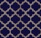 Elegant classic gold-colored moroccan trellis vector seamless pattern on dark blue background.