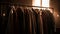 Elegant clothing collection hanging in modern boutique clothing store generated by AI