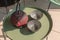 Elegant corner of a terrace of a modern house with two armchairs and a Chinese tea with two cups