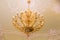 Elegant crystal chandelier.vintage pendant chandelier. Large crystal chandelier with pendants in ceiling. Luxurious