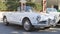 Elegant design of white antique white car model Alfa Romeo Giulietta Spider 1.300 manufactured by Italian Alfa Romeo