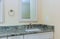 Elegant designer sink in bathroom in counter tap luxury home