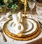 Elegant dinner table setting arrangement in English country style as flatlay tablescape, folded napkin on a serving plate,