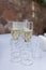 Elegant display of champagne glasses arranged for a wedding toast, sparkling white wine for a celebratory moment