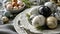 Elegant easter eggs with black and white marble patterns, arranged on a white plate with copy space.