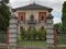 Elegant entrance gate and architecture to villa Italy Europe