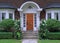 Elegant entrance with wood grain door