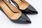 Elegant expensive black high heel women shoes, close up