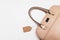 Elegant fashionable formal beige leather handbag for business woman on white background, trendy minimalistic luxury style with