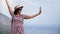 Elegant female photographing use smartphone mountain peak over sea smiling enjoying travel vacation