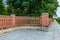 An elegant fence made of brick columns. Background with copy space for text