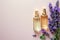 Elegant flat lay of body oils and perfume bottles with lavender sprigs on a pastel background, minimalist style