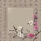 Elegant frame design with sakura blooming branch on a chinese calligraphic background.