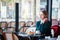 Elegant French woman in Parisian cafe