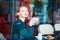 Elegant French woman in Parisian cafe