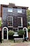 An elegant  Georgian house with glazed grey bricks.