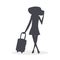 Elegant girl with a suitcase goes on a journey to adventure. She wears a beautiful dress, high heels shoes and a big straw hat. A