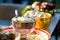 elegant golden bowl for bride and groom give aims food to Buddhist monk in thai traditional wedding ceremony.