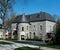 Elegant Gray Stone Mansion with Round Turret