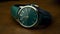 Elegant Green Leather Watch In Dark Cyan And Gold - Realistic Rendering
