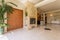 Elegant hallway with travertine fireplace