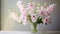 Elegant Hollyhock And Lily Arrangement For Serene Living Spaces