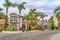 Elegant homes along road lined with palm trees in Long Beach scenic neighborhood